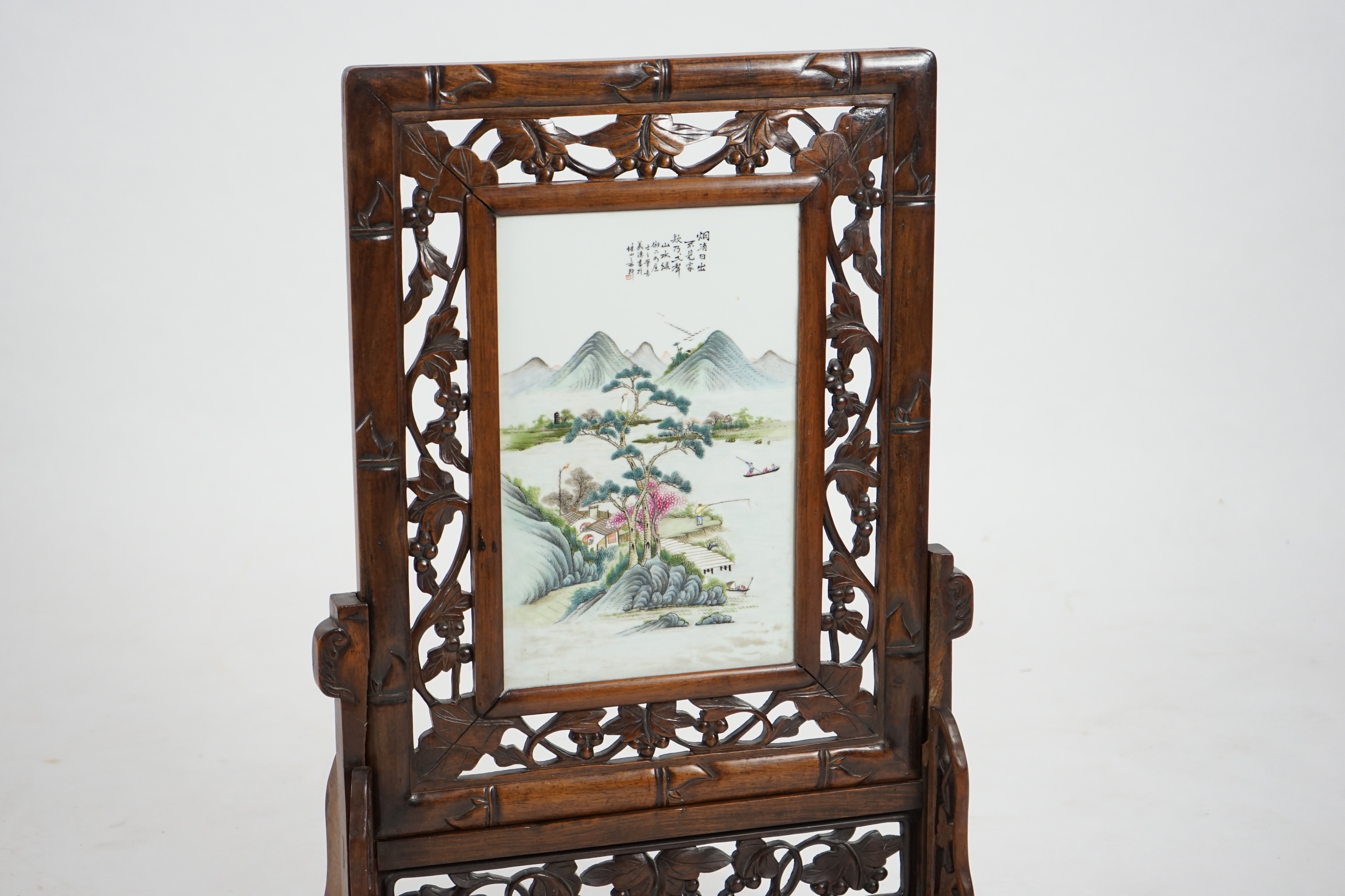 A Chinese enamelled porcelain and hongmu framed table screen, Republic period